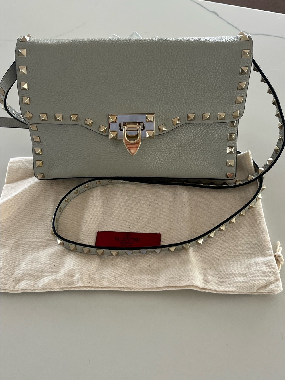 Valentino Garavani Rockstud Grained Leather Small Crossbody Bag in Light Grey
